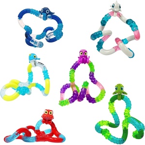 image:imageTANGLE Pets Aquatic Series Collection  Turtle Crab Dolphin Sting Ray Octopus Narwhal  Cute Fidgets for Boys and Girls  Aquatic Fidget Toys  Sea Creature Fidget Toys Fidgets